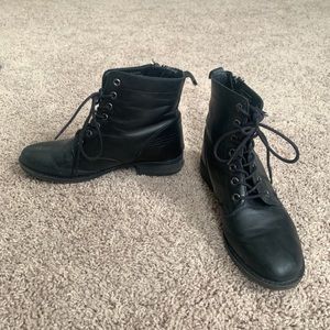 Black leather ankle boots with zipper